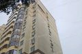 Фасад многоэтажки на улице Туполева обрушился на тротуар